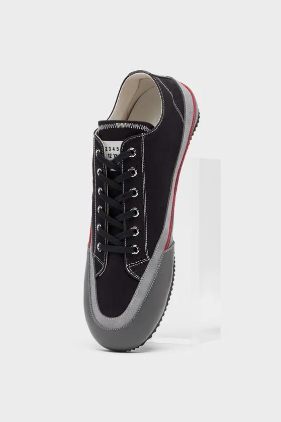 Maison Margiela Traveler